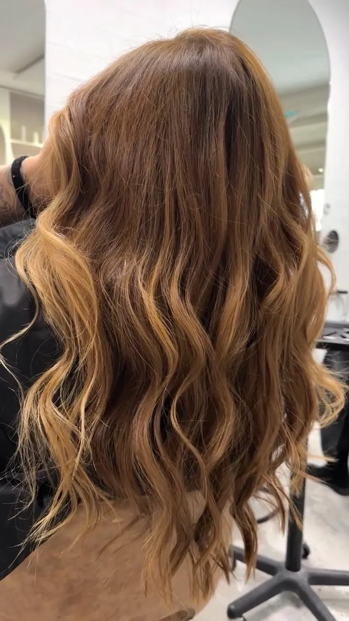 Warme balayage in lange golven